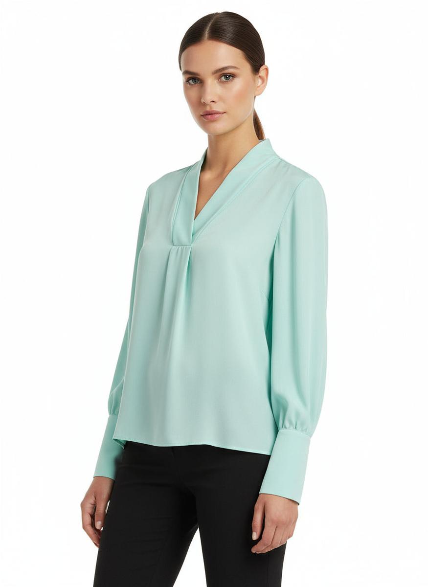 Blusa morbida con polsini