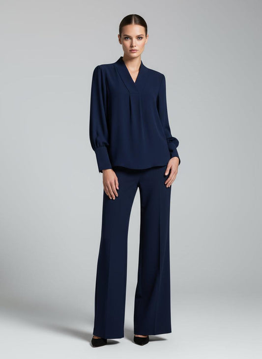 Blusa morbida con polsini